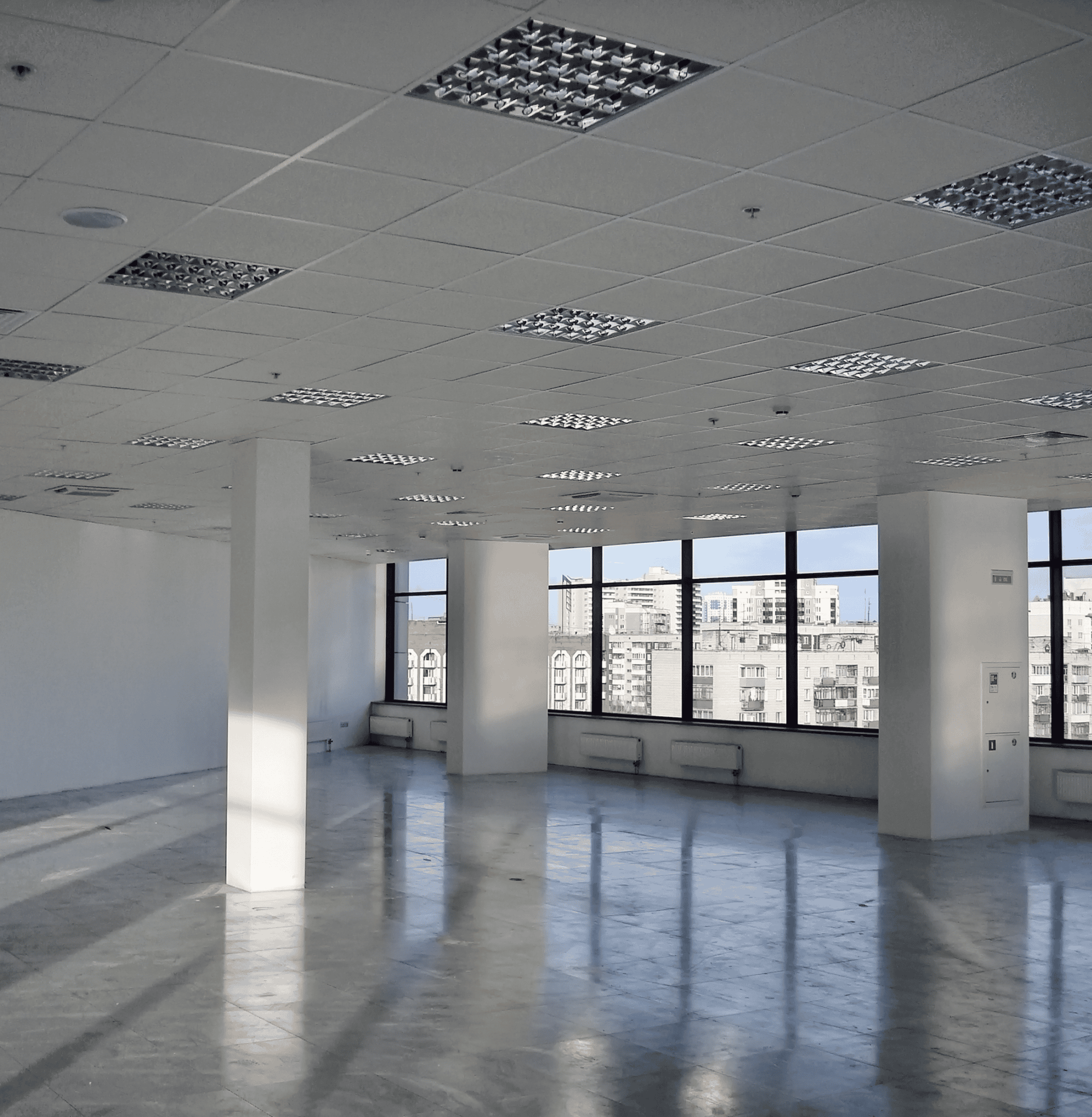 Empty office space with large window