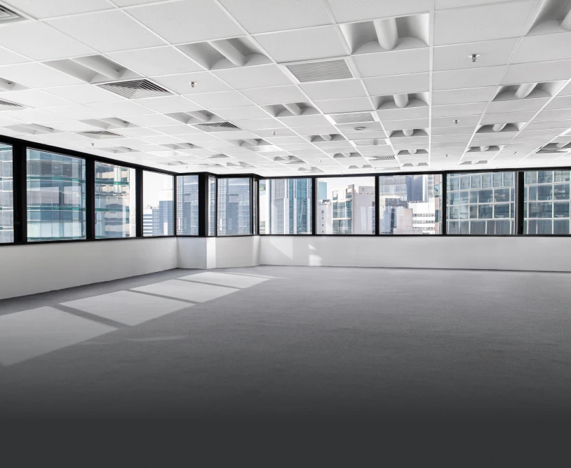 Bright empty room with large windows